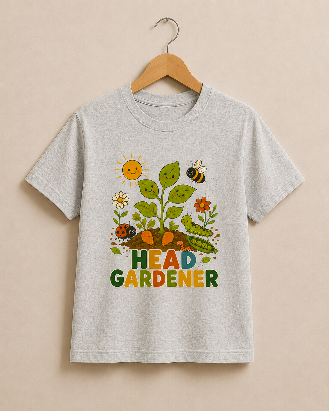Gray t-shirt with a colorful garden-themed design on a beige background