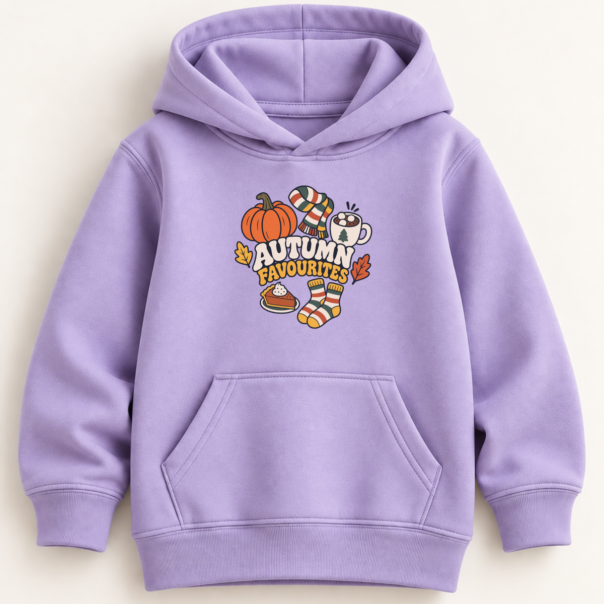A light purple kids' pullover hoodie with a 'Autumn Favourites' graphic on the chest, featuring a pumpkin, striped socks, a coffee mug, and a pie on a warm cream background.