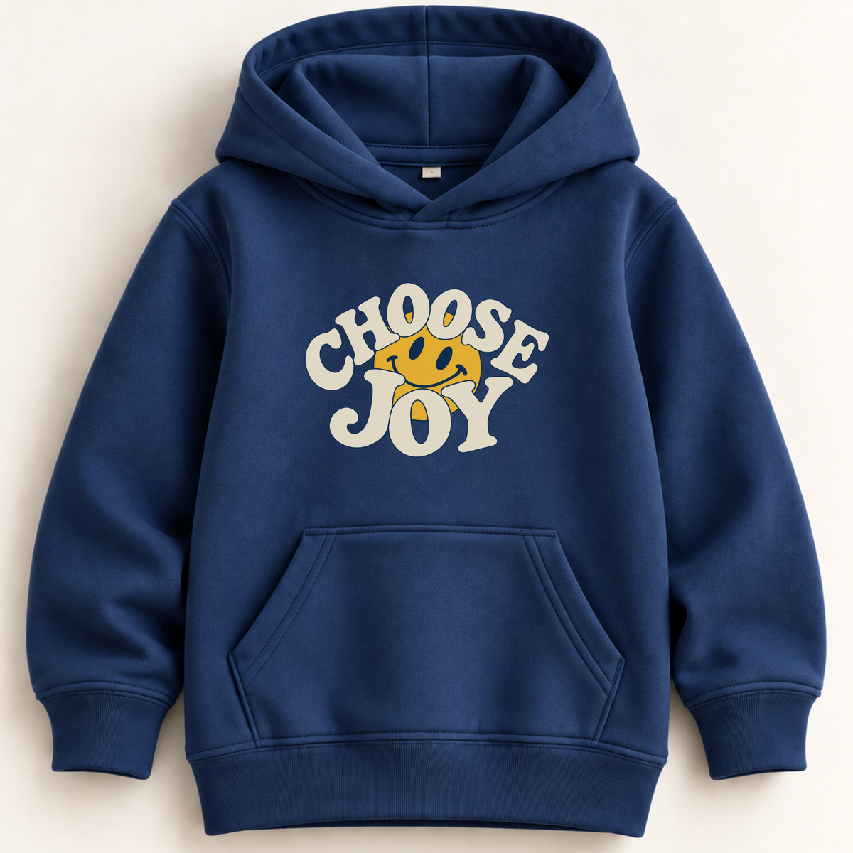 A navy blue pullover hoodie with a front kangaroo pocket and a graphic on the chest that reads 'CHOOSE JOY' in white lettering with a yellow smiley face, shown on a light beige background.