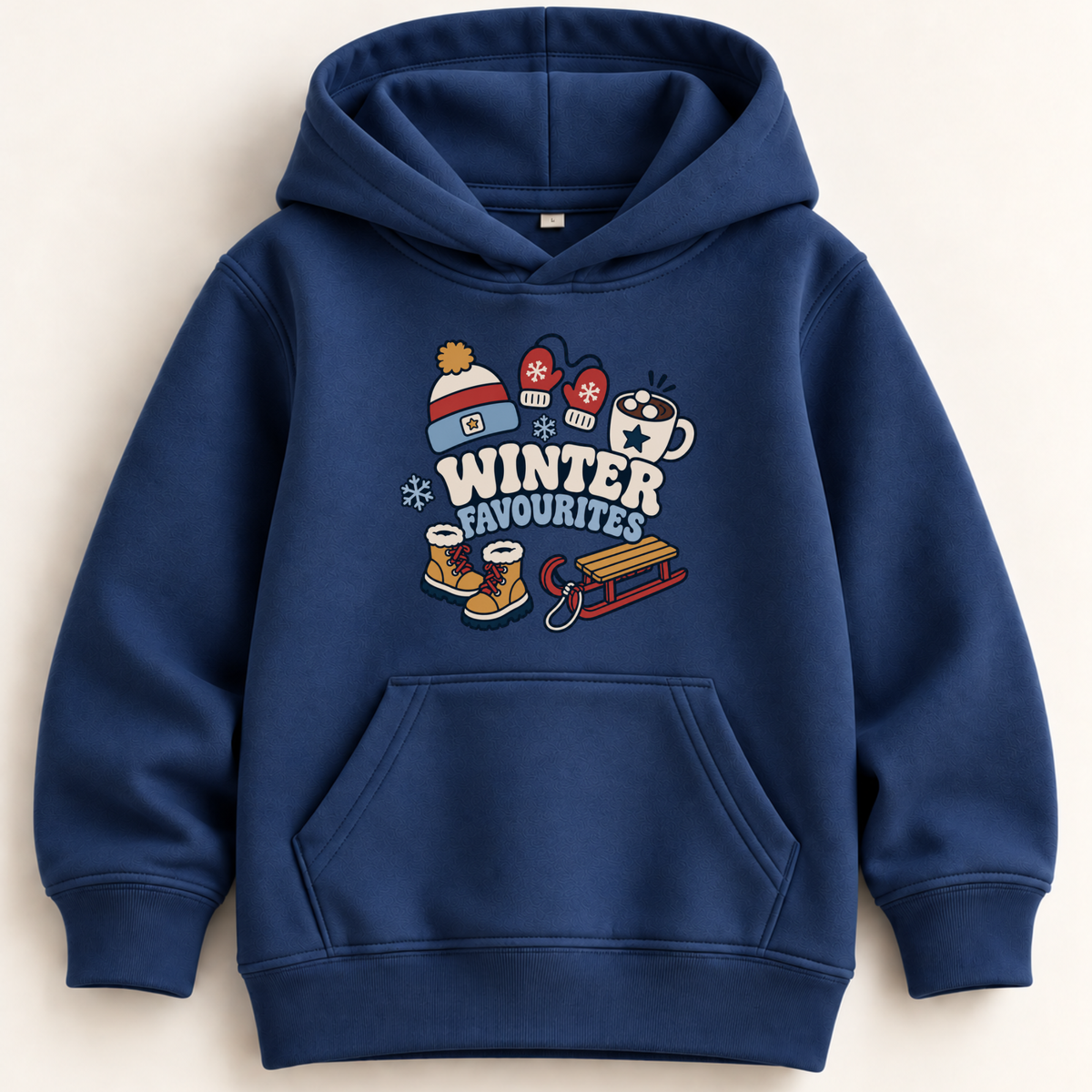 A navy blue kids' pullover hoodie with a front kangaroo pocket and a colorful 'Winter Favourites' graphic on the chest, displayed flat against a light beige background.