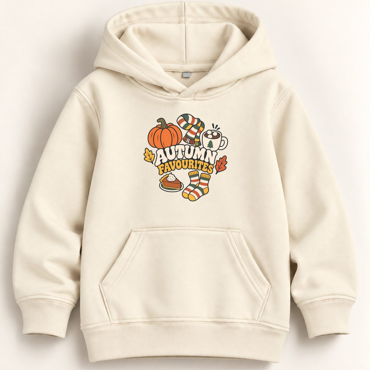 An off-white hooded sweatshirt with a front kangaroo pocket and a colorful autumn-themed graphic on the chest featuring a pumpkin, striped socks, a mug, and the text 'AUTUMN FAVOURITES'.